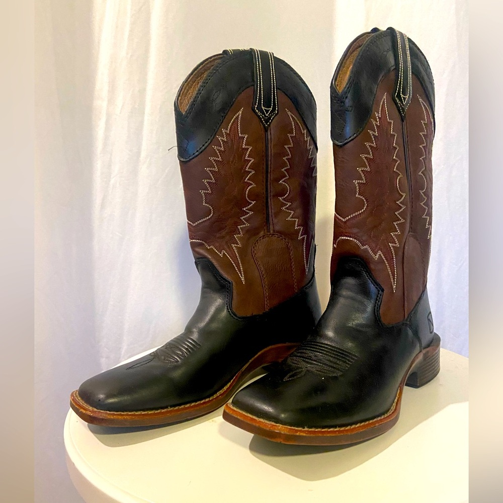 Noble brand - purchased in a tiny Montana ranch shop.Black+ Brown Cowboy Boots